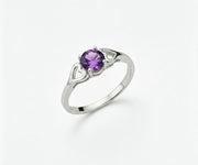 Amethyst and sterling silver ring featuring a rich purple gemstone that combines elegant sophistication with a touch of vibrant color